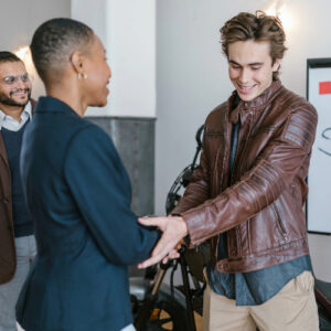 A man and a Woman shaking hands.